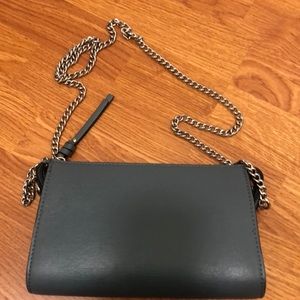 Blue crossbody purse with silver chain